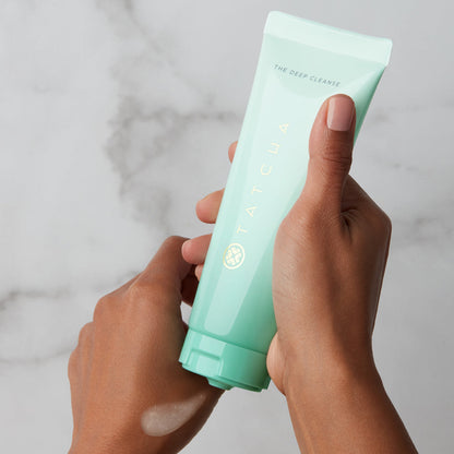 Hands holding the Deep Cleanse